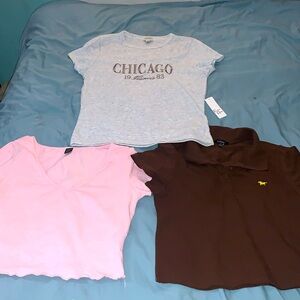 Pink, Brown, and White Shirts